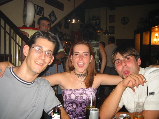 Fred, Monica and her boyfriend Alex in a bar