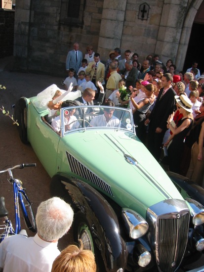 The beautiful car that picked them up in front of the church