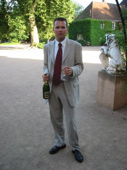 Arnaud posing for me with a champagne bottle :-)