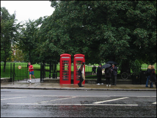 Two phone cabins, two umbrellas... London once more!