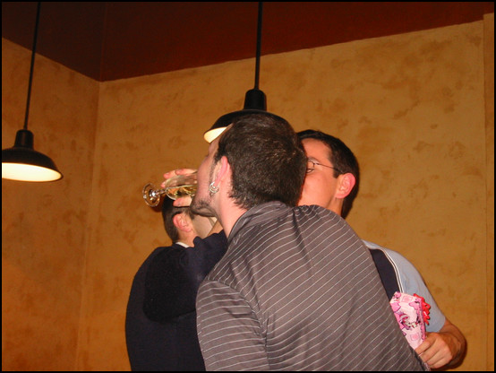 The three guys drinking cava